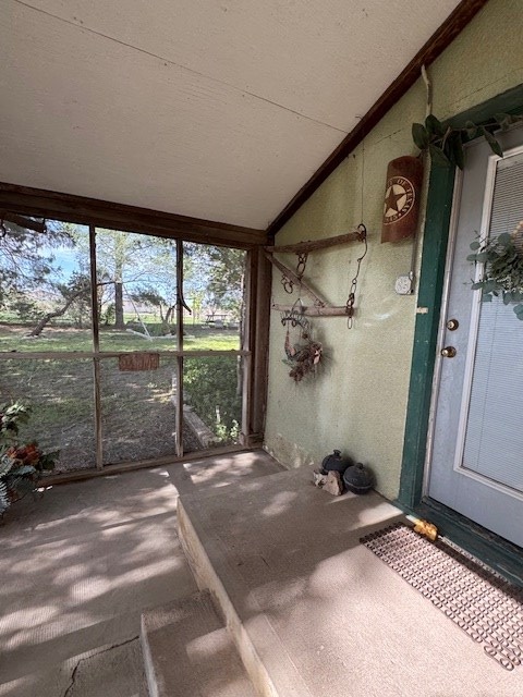 5038 N Sullivan Rd, Fort Stockton, TX 79735 - unfurnished sunroom with lofted ceiling