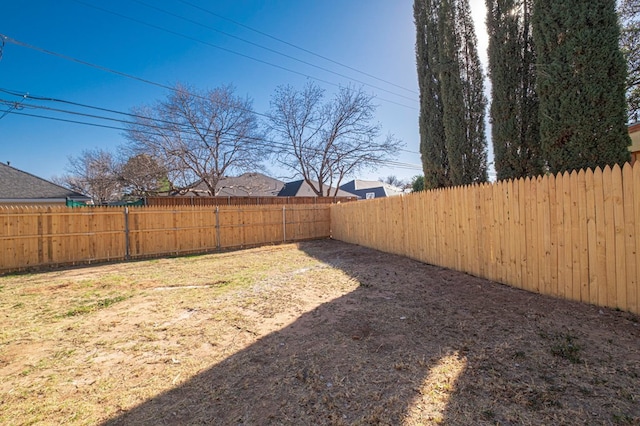 view of yard featuring a fenced backyard