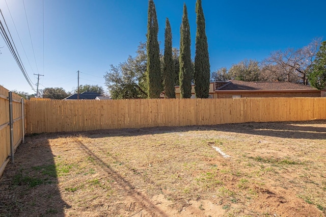 view of yard featuring a fenced backyard