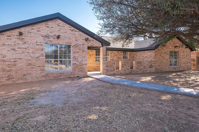 ranch-style house with brick siding