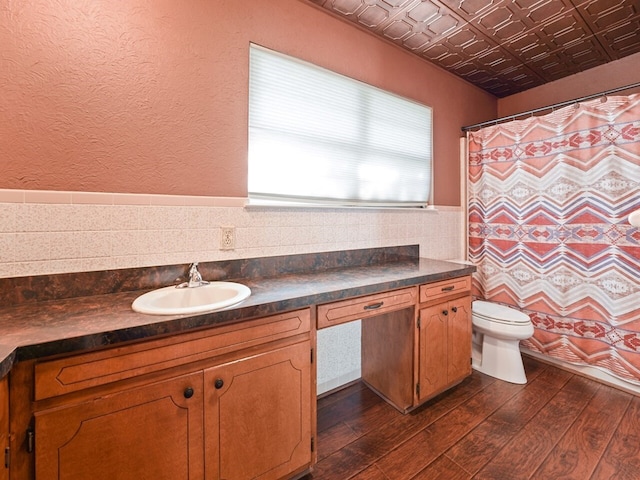 bathroom with vanity, hardwood / wood-style flooring, toilet, and a shower with shower curtain