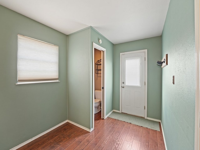 doorway featuring hardwood / wood-style flooring