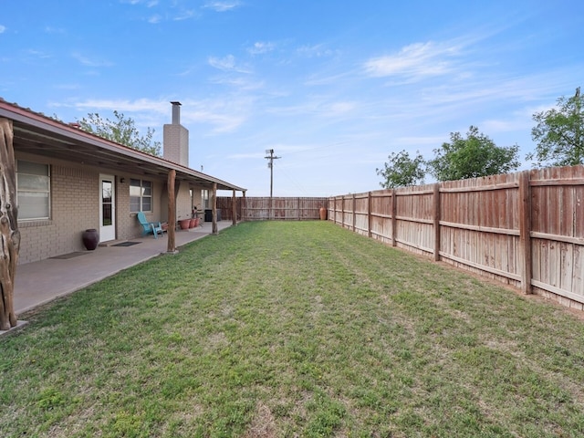 view of yard with a patio area