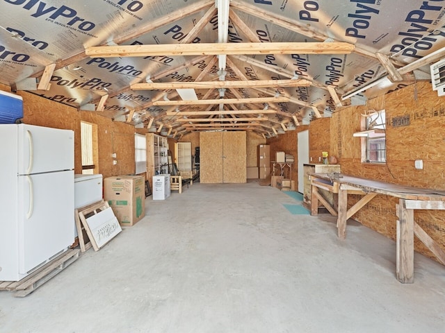 misc room with lofted ceiling