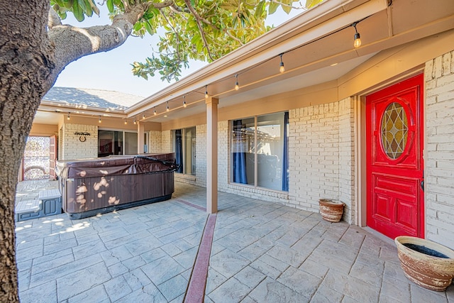 view of patio featuring a hot tub