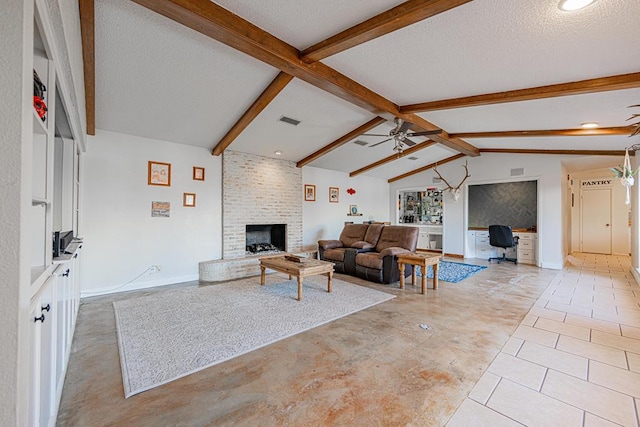 living room featuring light tile patterned flooring, lofted ceiling with beams, a brick fireplace, a textured ceiling, and ceiling fan