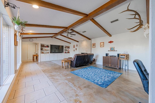 tiled living room with lofted ceiling with beams, ceiling fan, and built in shelves