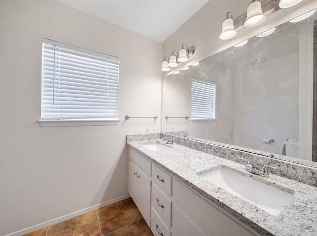 bathroom featuring vanity and tile patterned floors