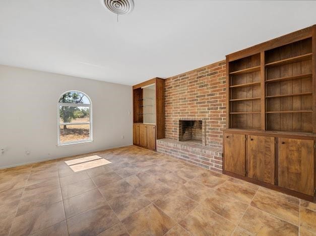 unfurnished living room with a fireplace