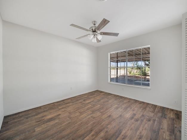 unfurnished room featuring dark hardwood / wood-style floors