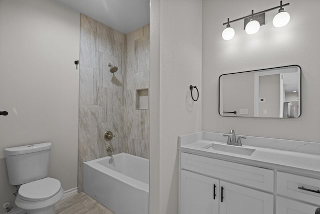 2710 Beachwood St, Midland, TX 79706 - bathroom featuring toilet, vanity, tub / shower combination, and baseboards
