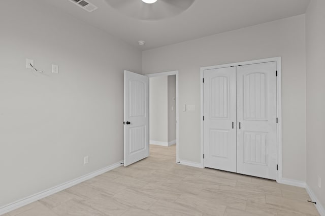 2710 Beachwood St, Midland, TX 79706 - unfurnished bedroom featuring a closet, baseboards, and a ceiling fan