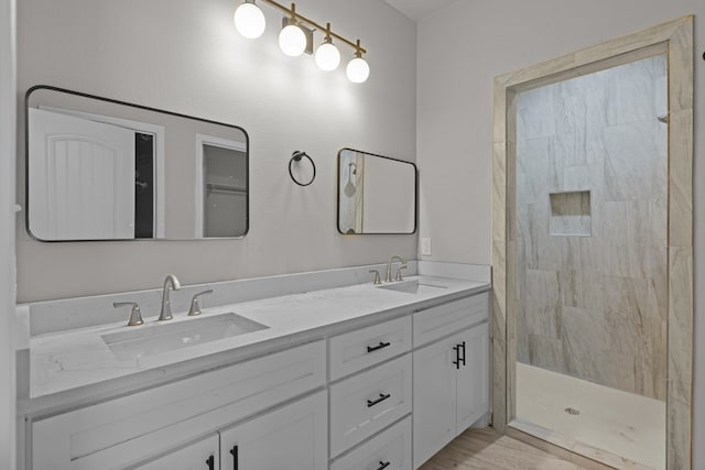 2710 Beachwood St, Midland, TX 79706 - bathroom featuring tiled shower and double vanity
