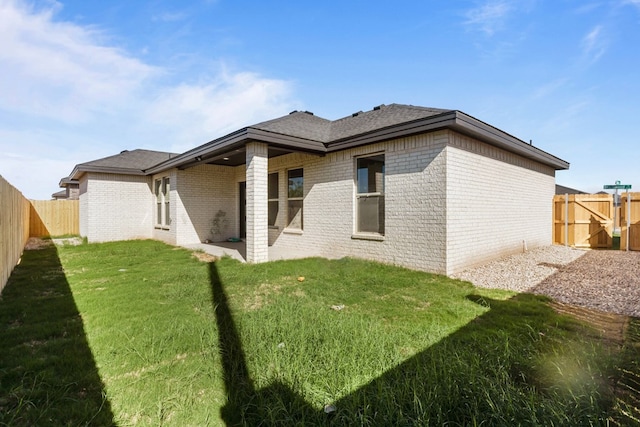 2710 Beachwood St, Midland, TX 79706 - rear view of house featuring brick siding