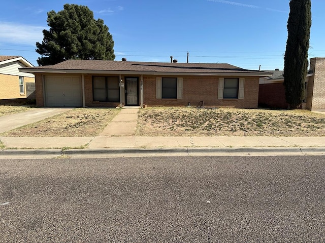 single story home featuring a garage