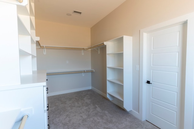2209 S County Rd 1059, Midland, TX 79706 - spacious closet featuring carpet floors