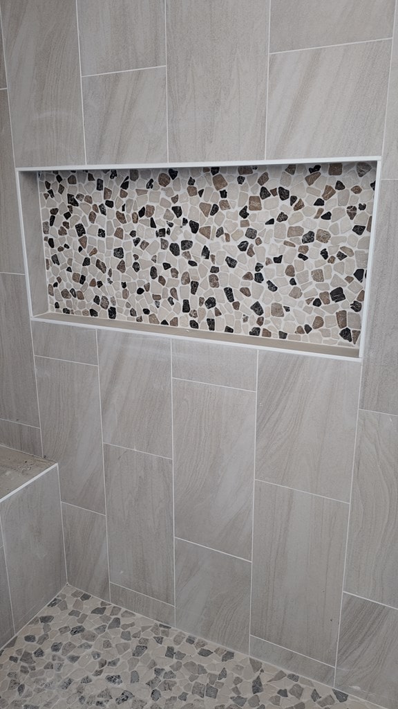interior space featuring tiled shower