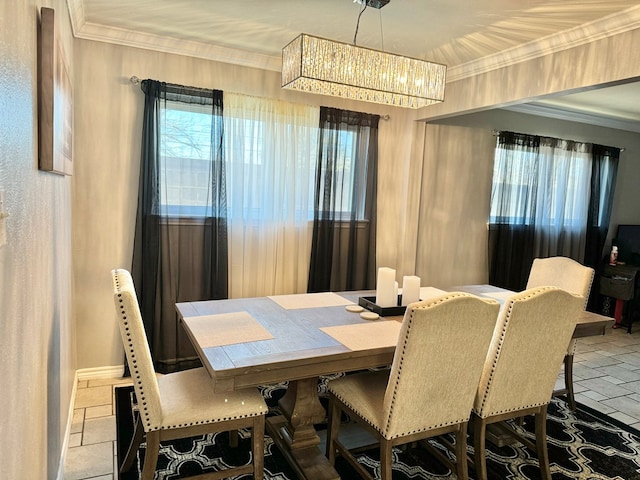 dining area with ornamental molding