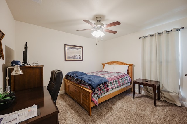 carpeted bedroom with baseboards and ceiling fan