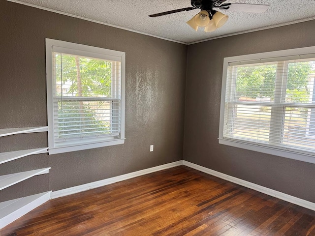 1207 W Tennessee Ave, Midland, TX 79701 - empty room with a textured wall, hardwood / wood-style flooring, a ceiling fan, ornamental molding, and a textured ceiling