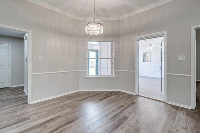 5706 Devlin Pl, Midland, TX 79707 - unfurnished dining area featuring wood finished floors, a chandelier, baseboards, and ornamental molding