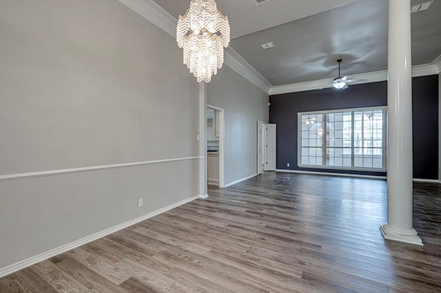 5706 Devlin Pl, Midland, TX 79707 - unfurnished living room with crown molding, wood finished floors, ceiling fan, a chandelier, and baseboards