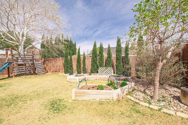 5706 Devlin Pl, Midland, TX 79707 - view of yard with a playground and a garden