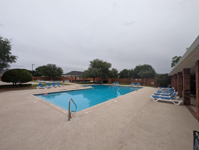 5706 Devlin Pl, Midland, TX 79707 - community pool with a patio area and a gazebo