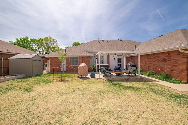 5706 Devlin Pl, Midland, TX 79707 - rear view of property featuring a pergola, brick siding, a patio area, and a shingled roof