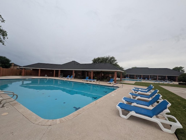 5706 Devlin Pl, Midland, TX 79707 - community pool featuring a patio