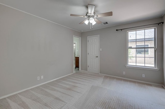 5706 Devlin Pl, Midland, TX 79707 - spare room with ceiling fan, carpet floors, and baseboards