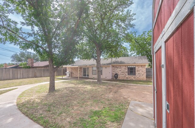 4906 San Antonio Ave, Midland, TX 79707 - view of yard featuring a patio
