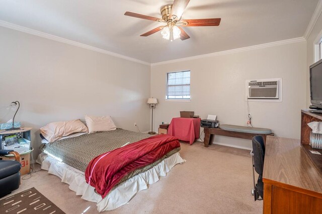 carpeted bedroom with ceiling fan, ornamental molding, and a wall mounted AC