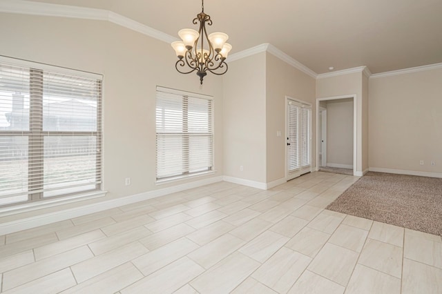 empty room with lofted ceiling, baseboards, a chandelier, and crown molding