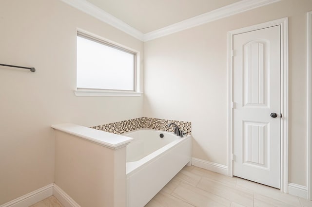 full bath with baseboards, ornamental molding, and a bath