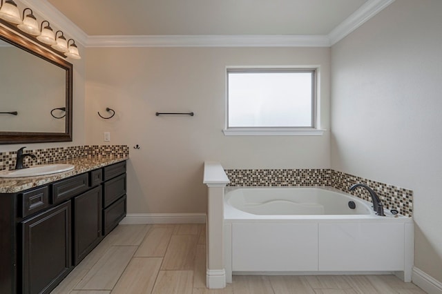 bathroom with ornamental molding, backsplash, a garden tub, and vanity