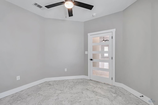 2102 S County Rd 1059, Midland, TX 79706 - unfurnished room with baseboards, visible vents, ceiling fan, and marble finish floor