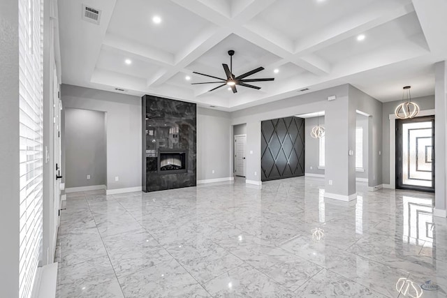2102 S County Rd 1059, Midland, TX 79706 - unfurnished living room featuring baseboards, visible vents, coffered ceiling, and marble finish floor
