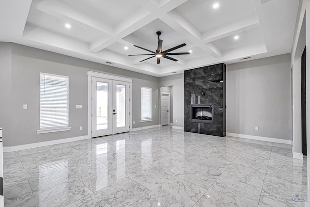 2102 S County Rd 1059, Midland, TX 79706 - unfurnished living room featuring baseboards, a ceiling fan, french doors, and marble finish floor