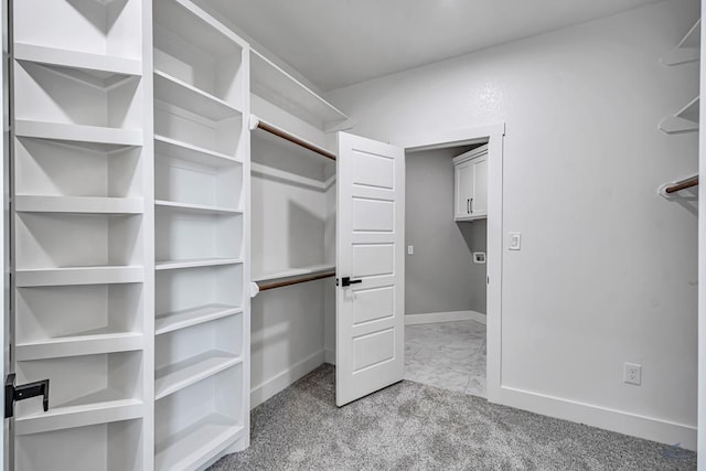 2102 S County Rd 1059, Midland, TX 79706 - spacious closet featuring carpet flooring