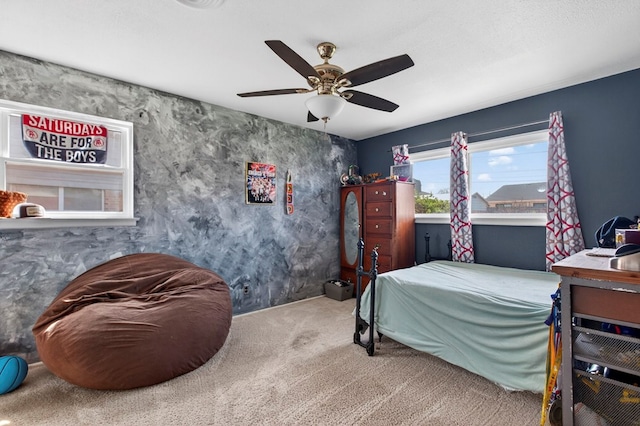 3811 Cimmaron Ave, Midland, TX 79707 - carpeted bedroom with a ceiling fan