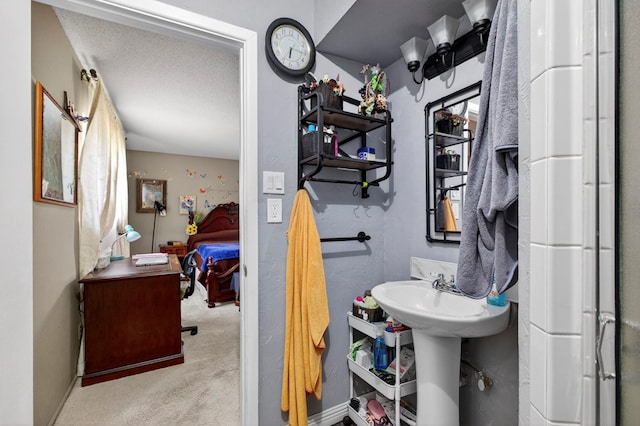 3811 Cimmaron Ave, Midland, TX 79707 - bathroom featuring baseboards