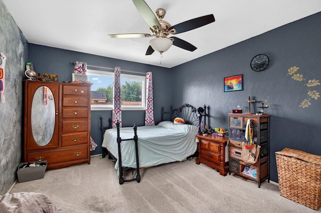 3811 Cimmaron Ave, Midland, TX 79707 - carpeted bedroom with a ceiling fan and baseboards