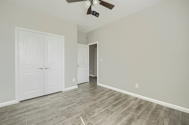 6913 Mcpherson Ln, Midland, TX 79706 - unfurnished bedroom with light wood-style flooring, a closet, baseboards, and ceiling fan