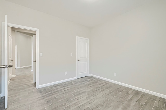 6913 Mcpherson Ln, Midland, TX 79706 - unfurnished room featuring wood tiled floors and baseboards