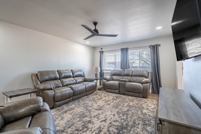 living room with recessed lighting, ceiling fan, and wood finished floors