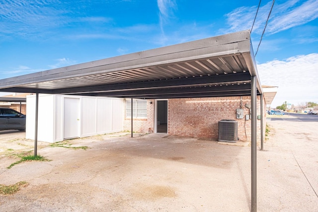 view of car parking featuring a carport