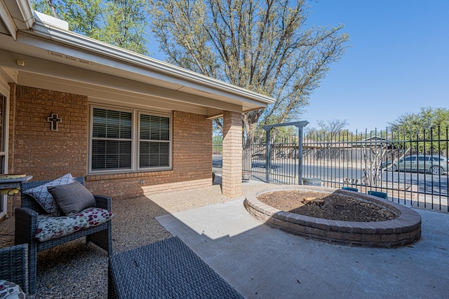 view of patio featuring fence