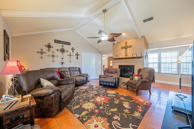 living room with visible vents, lofted ceiling with beams, a ceiling fan, a fireplace, and tile patterned floors