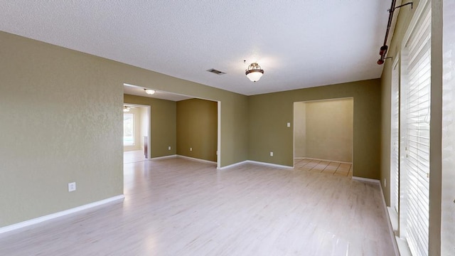 4203 Skyline Dr, Midland, TX 79707 - unfurnished room with light wood-style flooring and baseboards